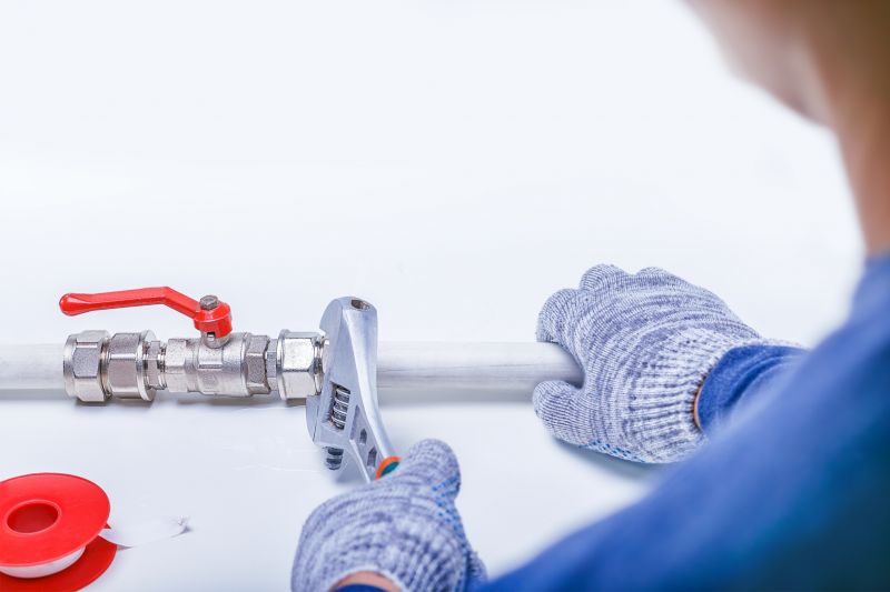 Plumber Fixing a Leak